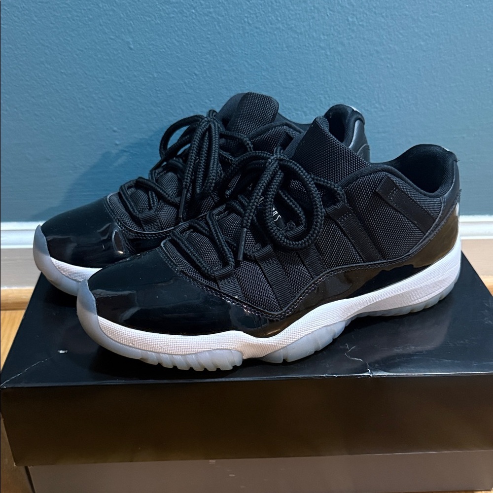 Jordan 11 Men's Black and White Low-Top Sneakers